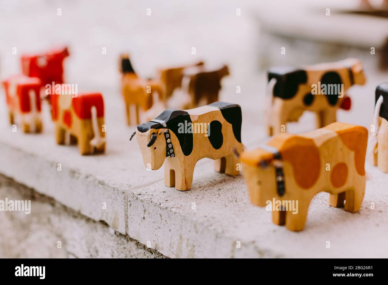 wooden cow souvenirs in Switzerland. Wooden cow toy Stock Photo