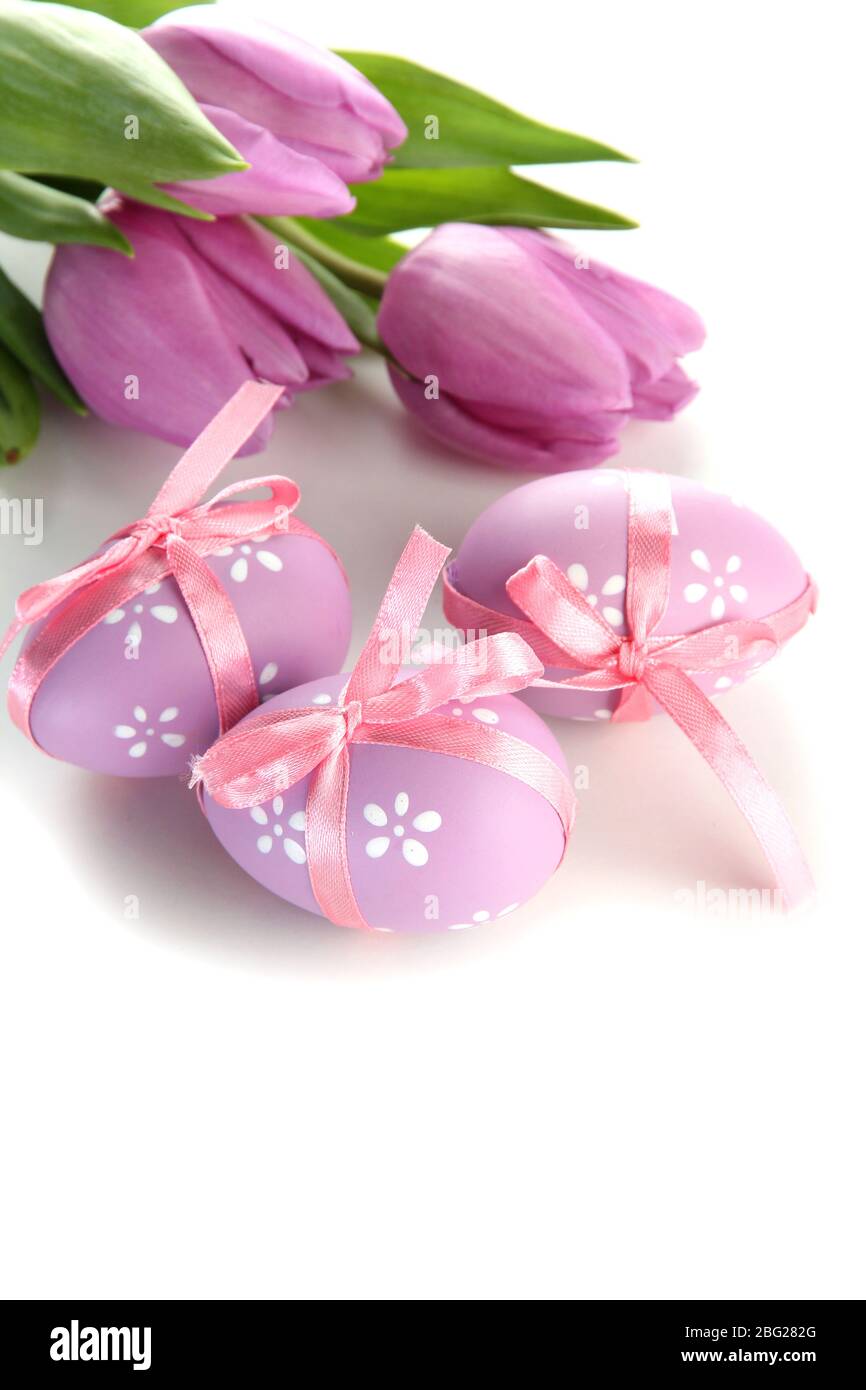 Bright easter eggs and tulips, isolated on white Stock Photo - Alamy