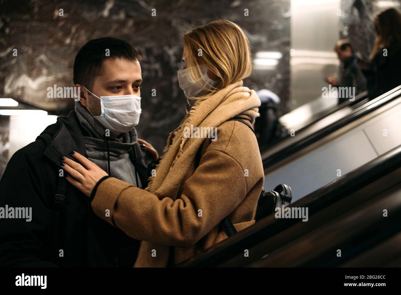 Man woman masks on underground hi-res stock photography and images - Alamy