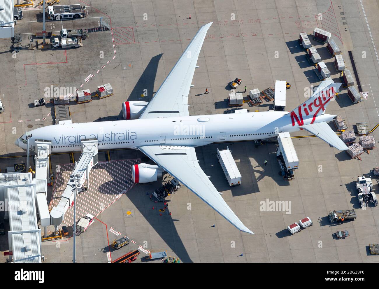 Virgin Australia Boeing 777 at Sydney International Airport. Aircraft registered as VH-VOZ. Airline in debt entering voluntary administration. Stock Photo