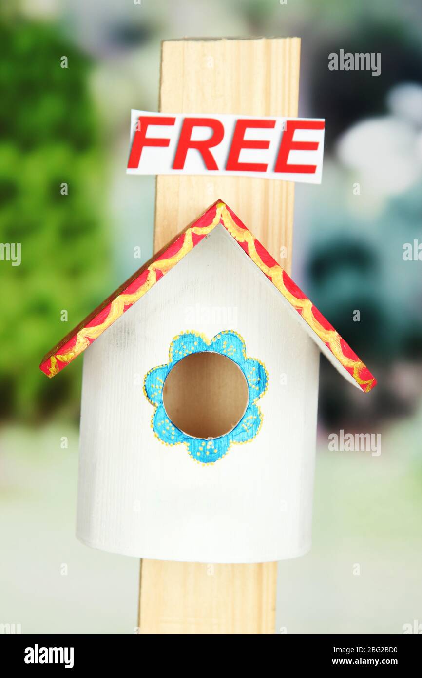 Decorative nesting box and sign on bright background Stock Photo Alamy