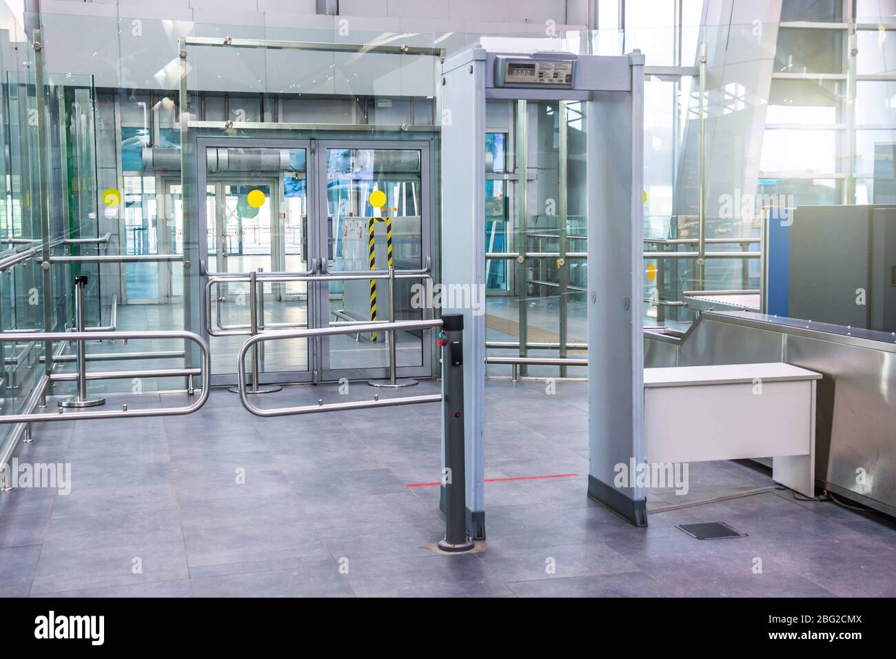 Security checks the metal detector installed at the entrance to a