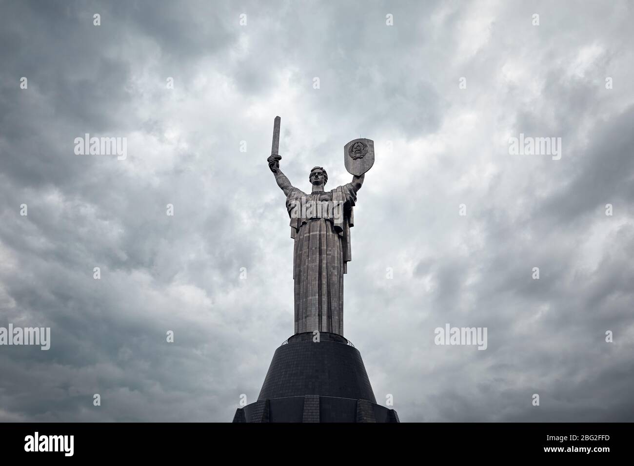 Mother Motherland statue at grey cloudy sky background in Kiev, Ukraine Stock Photo