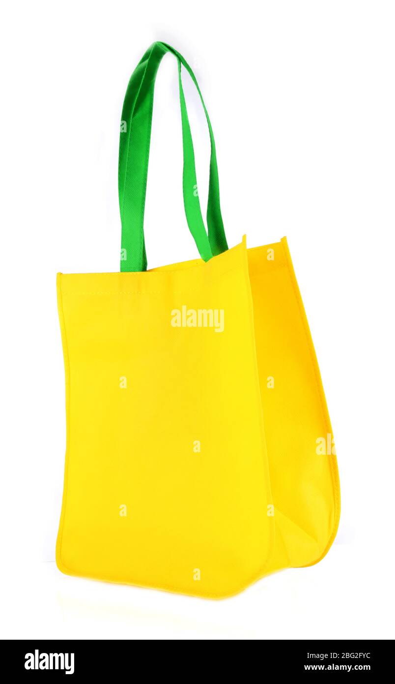 Yellow bag with green handles isolated on whit Stock Photo - Alamy