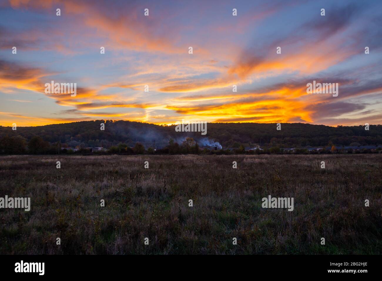 October Rural Background Rural background with countryside nature and houses in autumn evening ...
