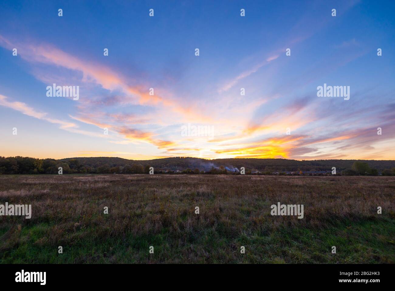 October Rural Background Rural background with countryside nature and houses in autumn evening ...