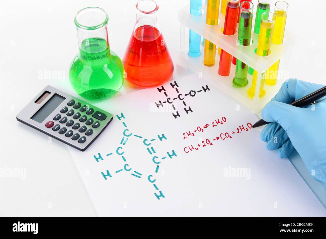 Hand scientist writing formulas isolated on white Stock Photo - Alamy