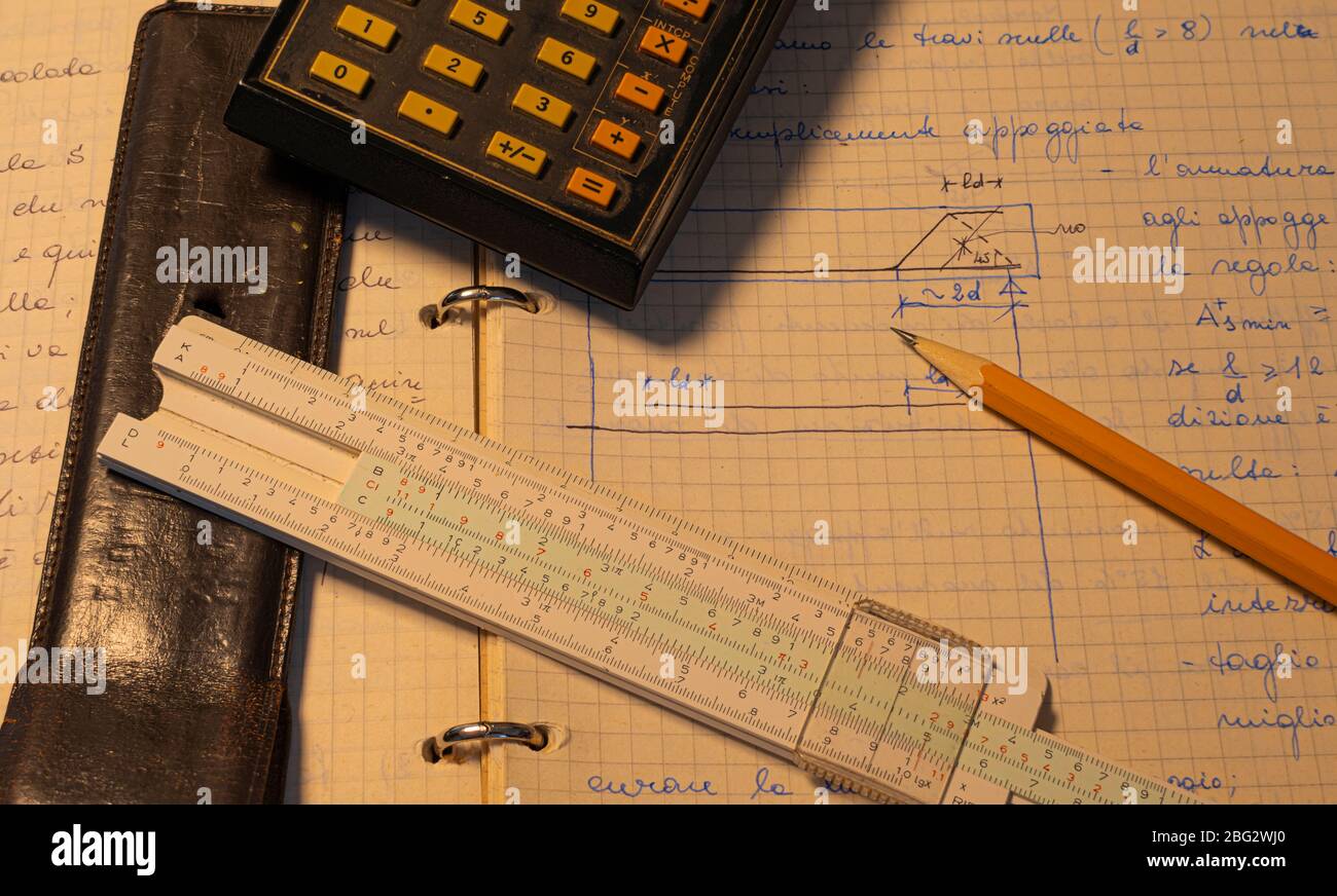 Pencil Old Slide Rule And Scientific Electronic Calculator Page With The Calculations In Progress Stock Photo Alamy