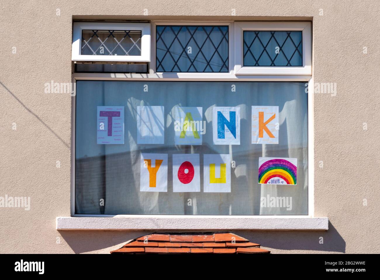 Rainbow coloured thank you window message during the COVID19