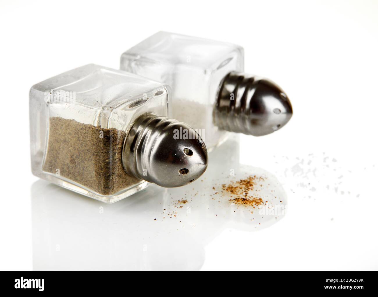 Containers for salt and pepper isolated on white Stock Photo Alamy