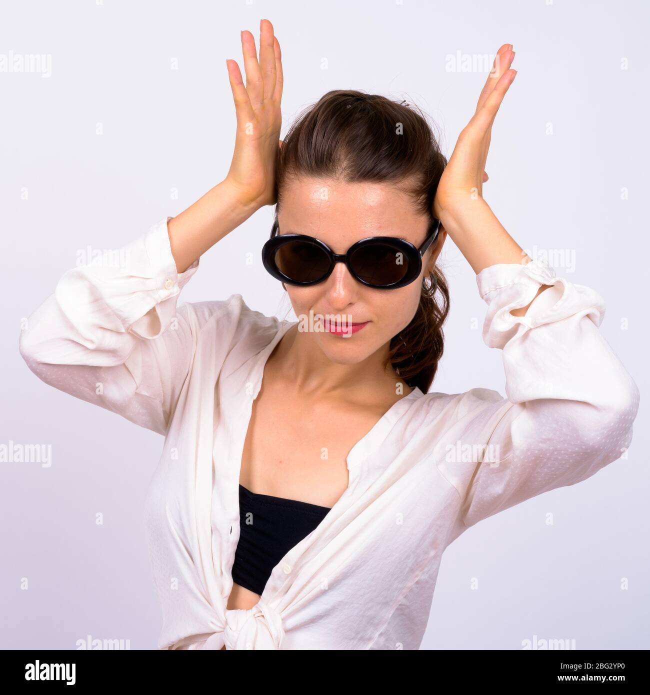 Portrait of young beautiful woman with sunglasses Stock Photo - Alamy