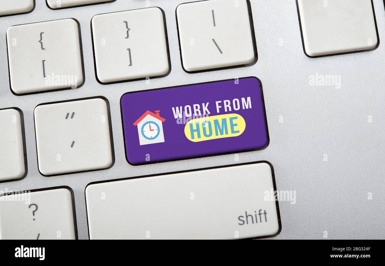 Work from home sign closeup on keyboard Stock Photo