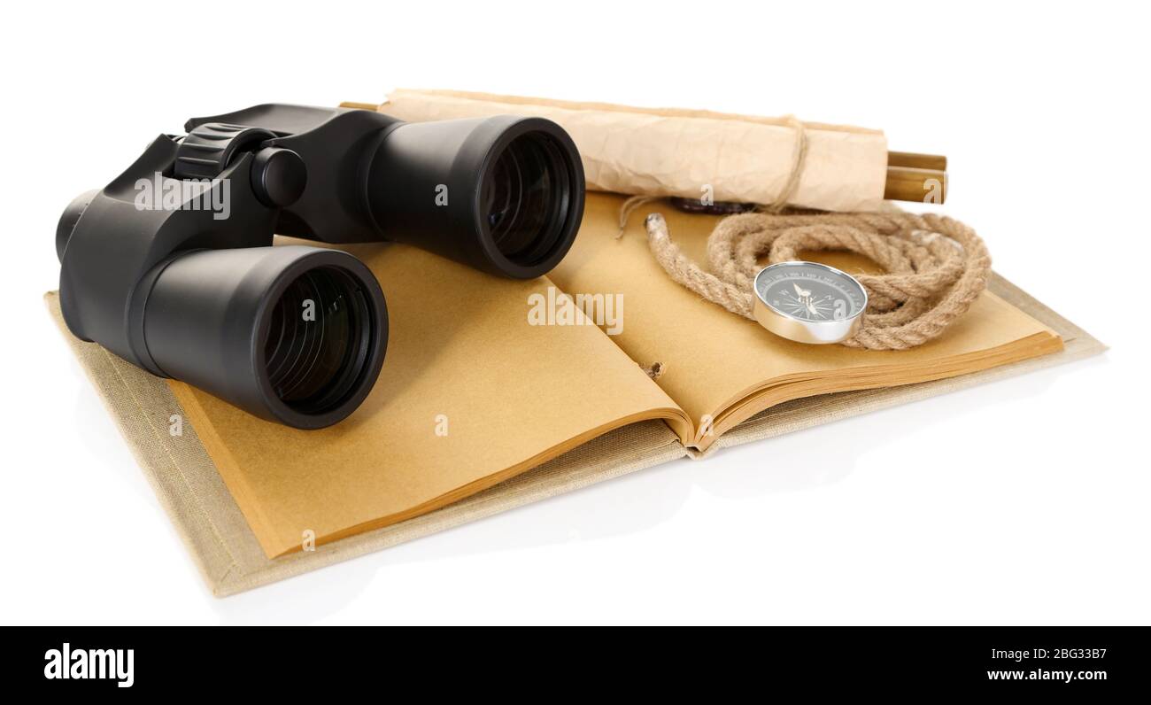 Black modern binoculars with old notebook isolated on white Stock Photo