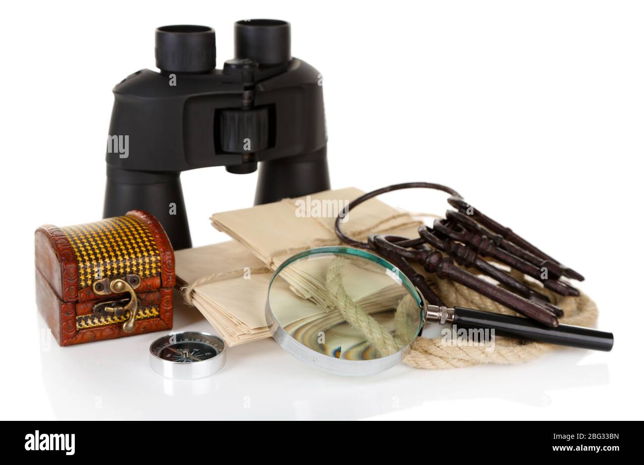 Black modern binoculars with old letters isolated on white Stock Photo