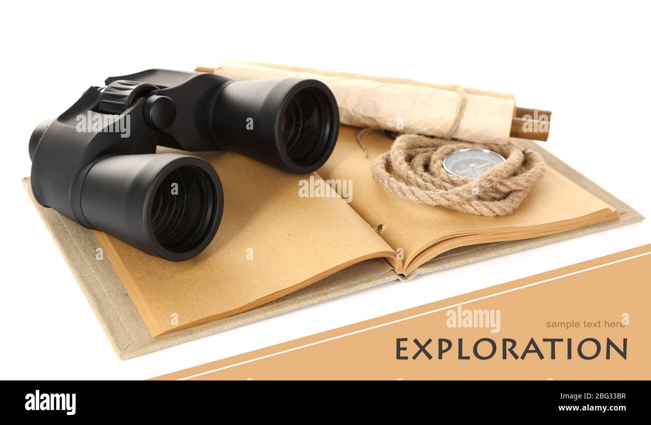 Black modern binoculars with old notebook isolated on white Stock Photo