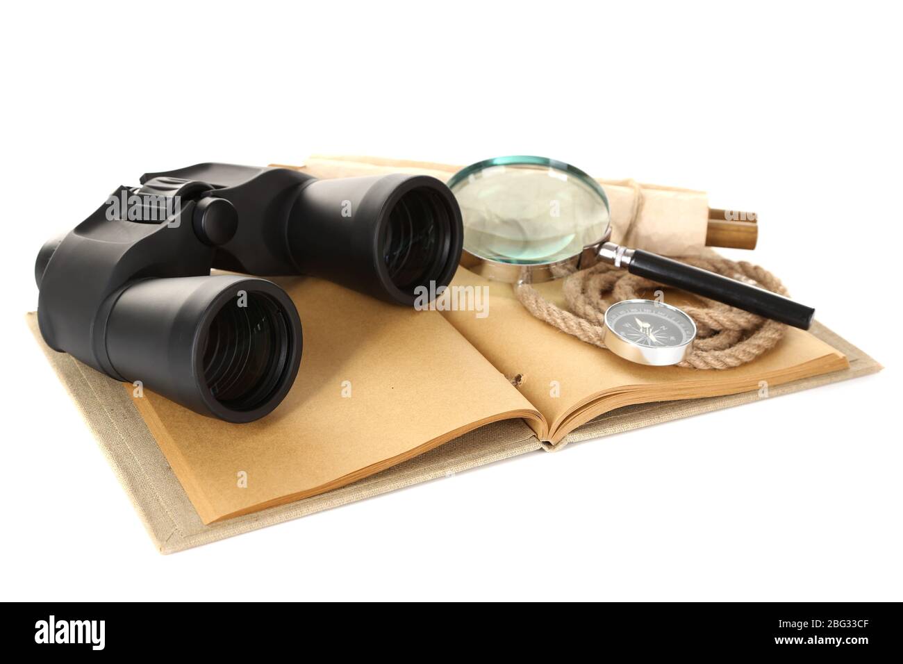 Black modern binoculars with old notebook isolated on white Stock Photo