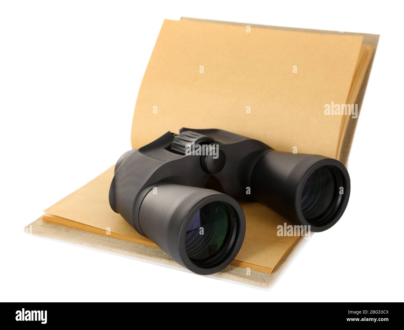 Black modern binoculars with old notebook isolated on white Stock Photo