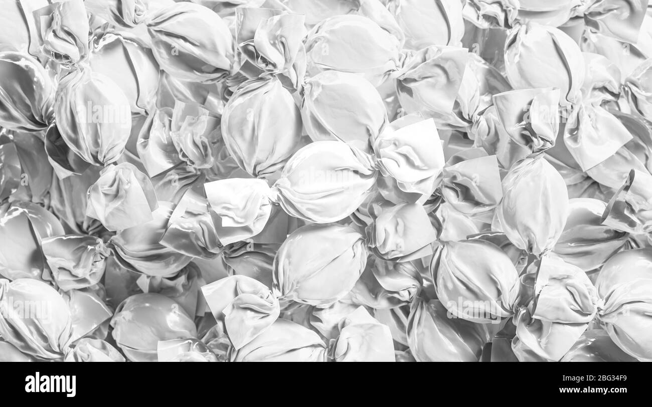 Blank white hard candy foil wrapper mockup stack Stock Photo