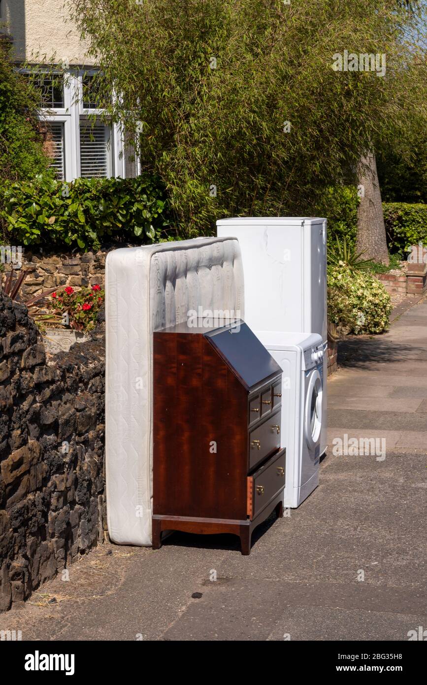 White goods and furniture left outside during the COVID-19 Coronavirus pandemic outbreak lockdown period in Westcliff, Southend on Sea, Essex, UK Stock Photo