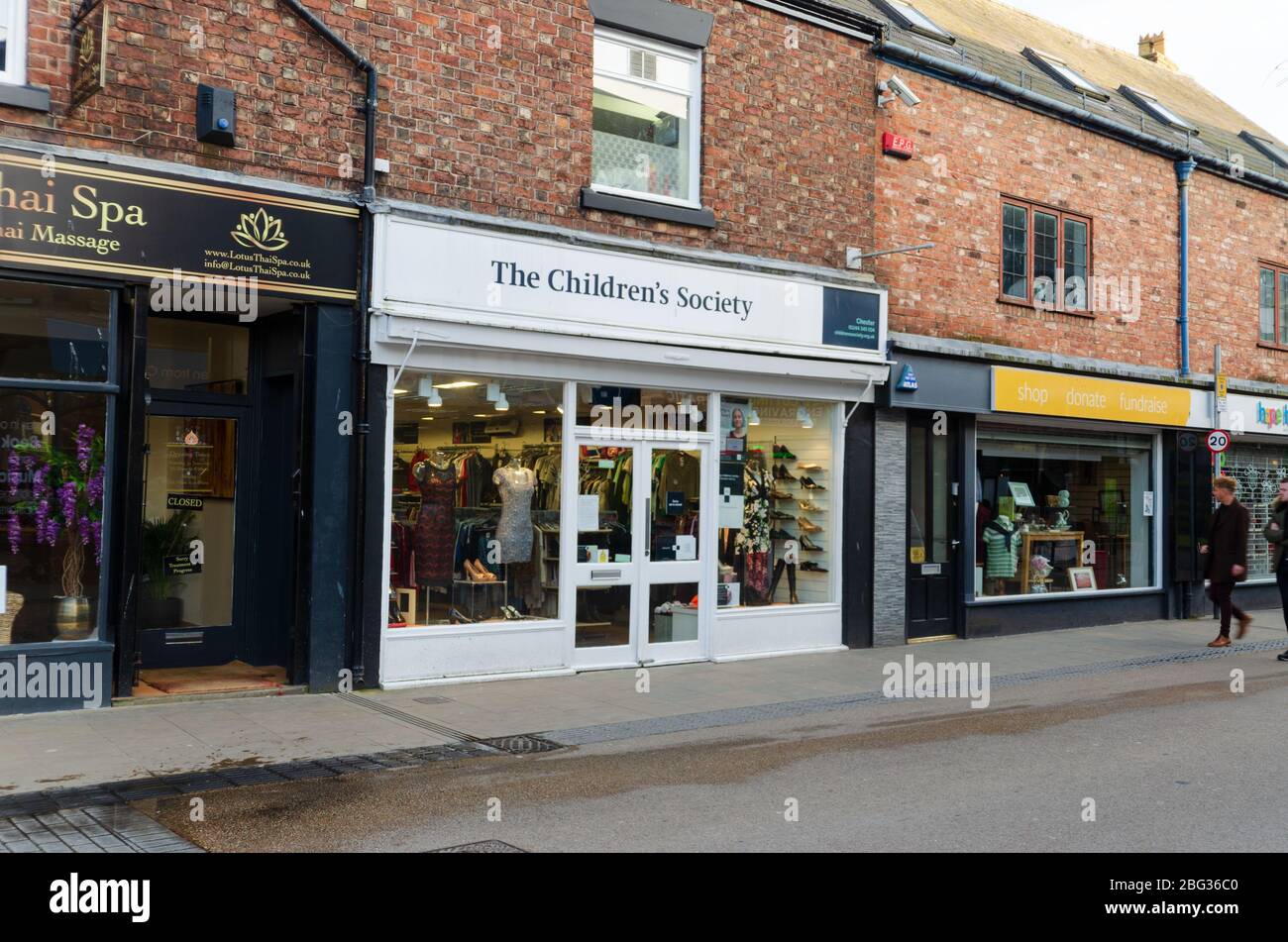 Chester, UK: Mar 1, 2020: The Frodsham Street charity shop which is operated by The Childrens Society, raises funds by retailing clothing and other go Stock Photo