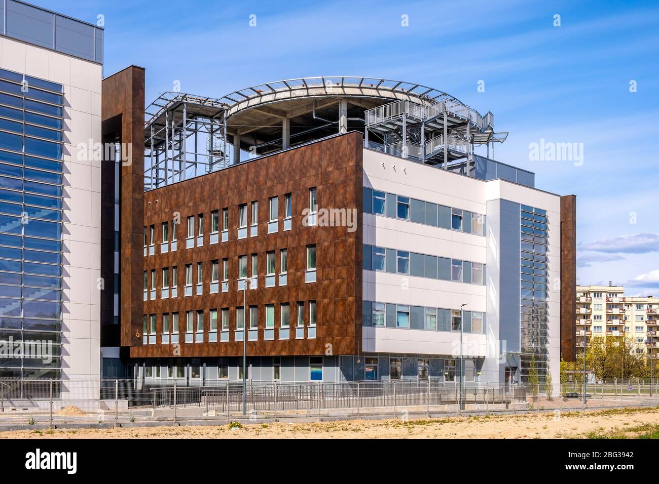 Warsaw, Mazovia / Poland - 2020/04/18: Newly developed Southern Hospital medical complex - Szpital Poludniowy - with rooftop helicopter landing field Stock Photo