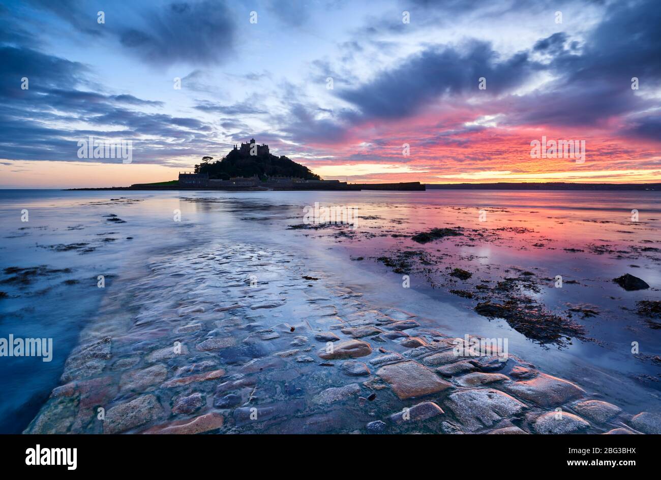 Sunset glow above St Michael's Mount and Mounts Bay Stock Photo