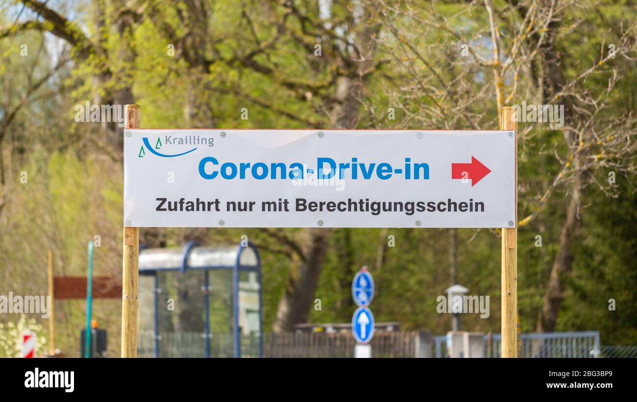 Sign leading to a so-called Corona Drive-In (Coronavirus / Covid-19 test station). Only people sent by a doctor will be tested with a mouth swab. Stock Photo
