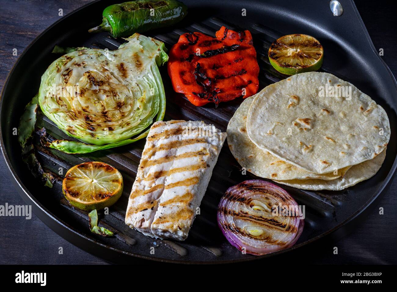 Grilled fish tacos. Indoor grill. Stock Photo