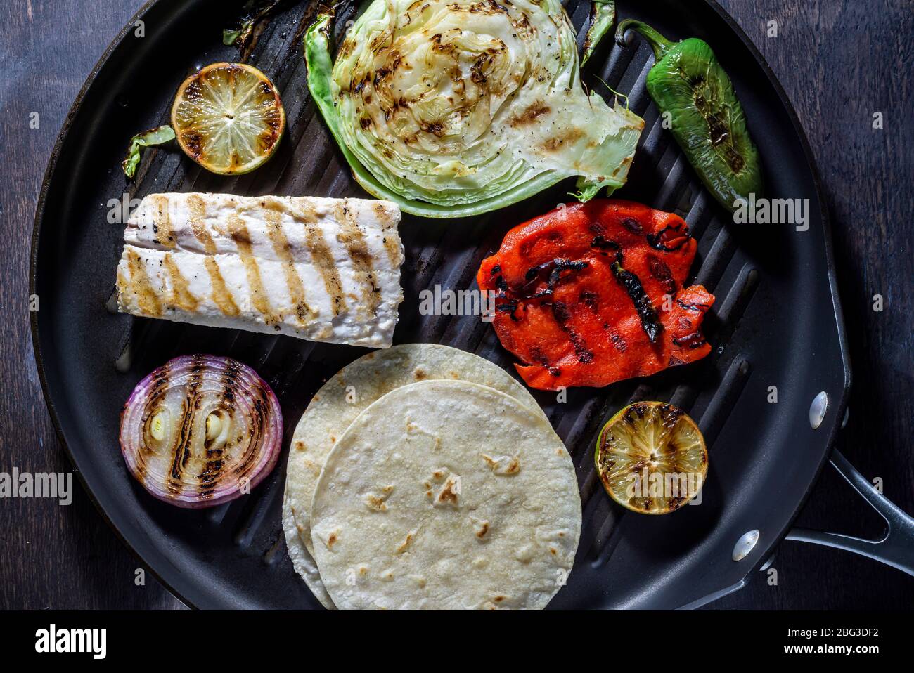 Grilled fish tacos. Indoor grill Stock Photo Alamy