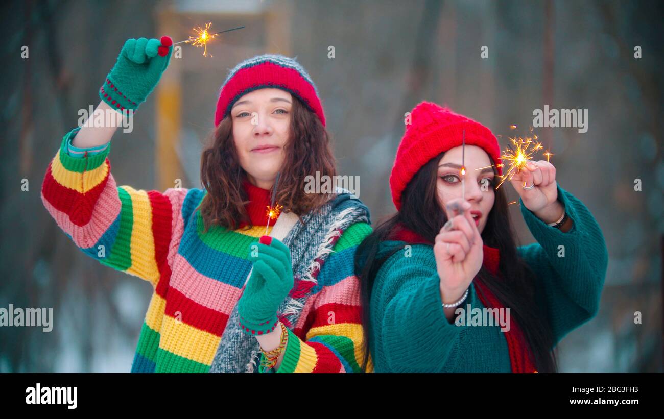 Two women on snowy bridge hi-res stock photography and images - Alamy