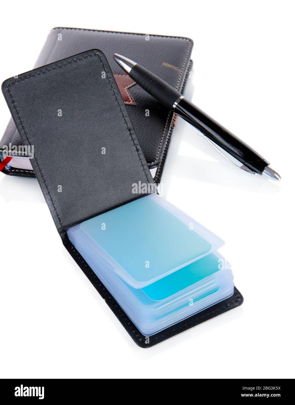 Black business card holder notebook and pen isolated on white Stock Photo