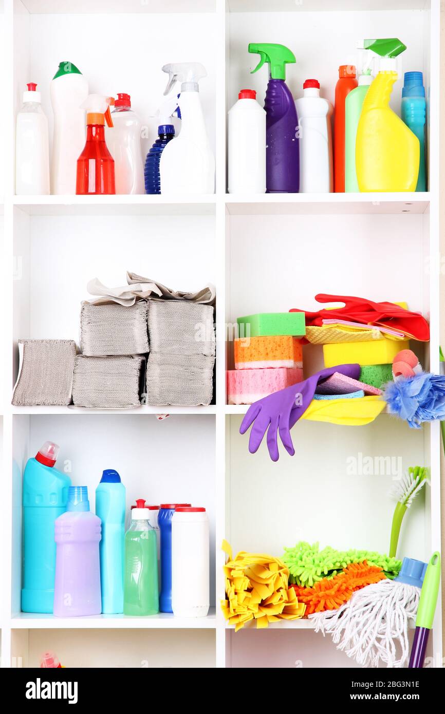 Shelves in pantry with  cleaners for home close-up Stock Photo