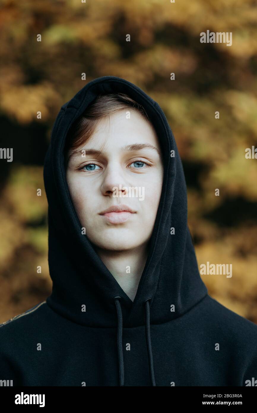 Portrait of a teenage boy standing outdoors in autumn, Netherlands Stock Photo