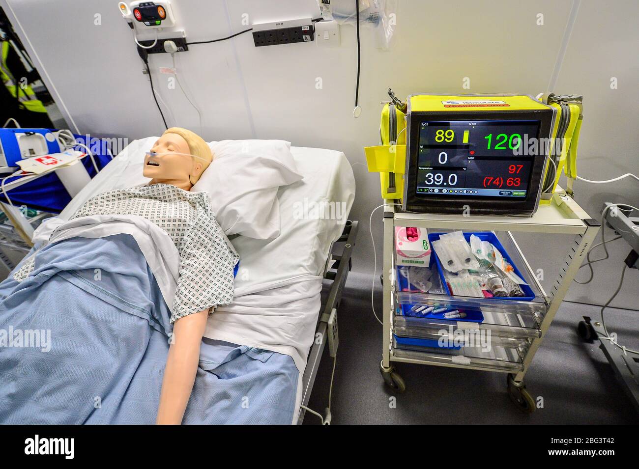 A machine simulating vital signs of a deteriorating patient is used inside a ward as part of medical training at the official opening of the new Dragon's Heart Hospital, built at the Principality Stadium, Cardiff, to care for coronavirus patients. Stock Photo