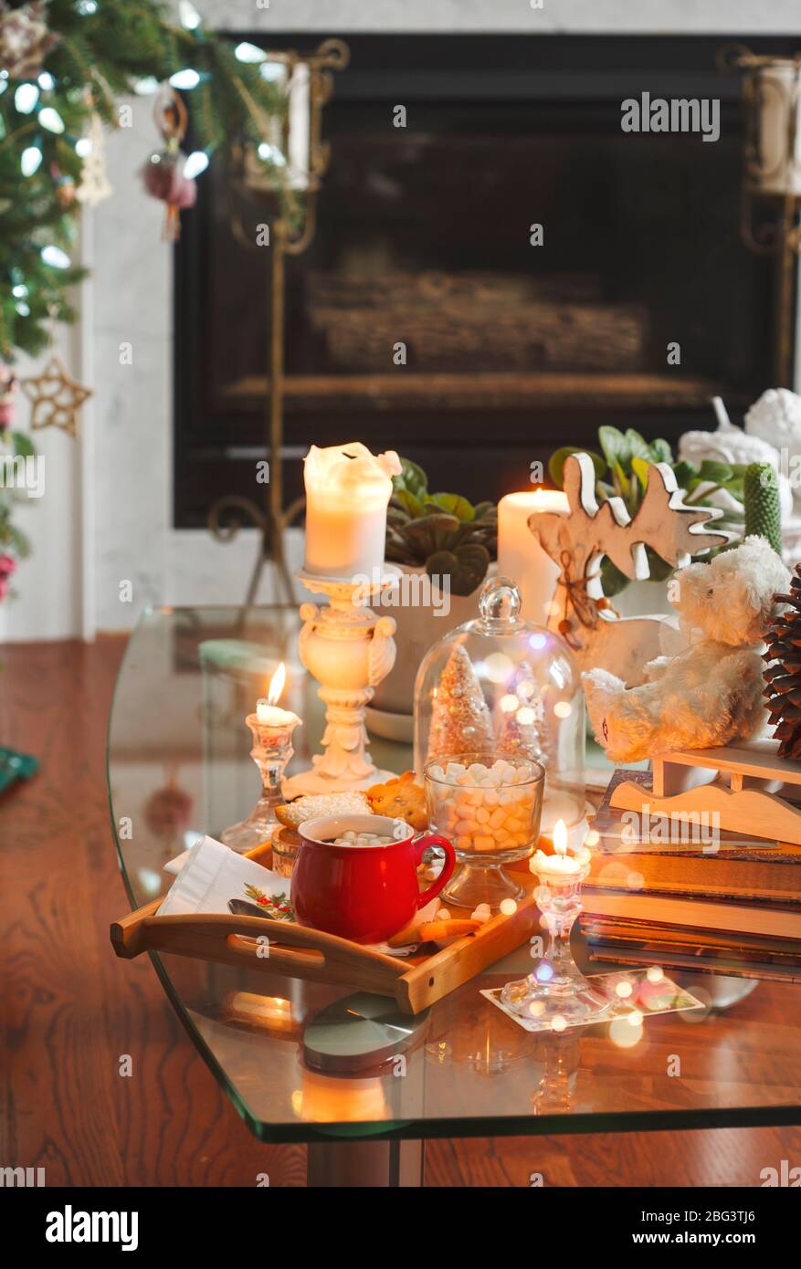 Cup of hot chocolate on a wooden tray on a table at Christmas Stock Photo