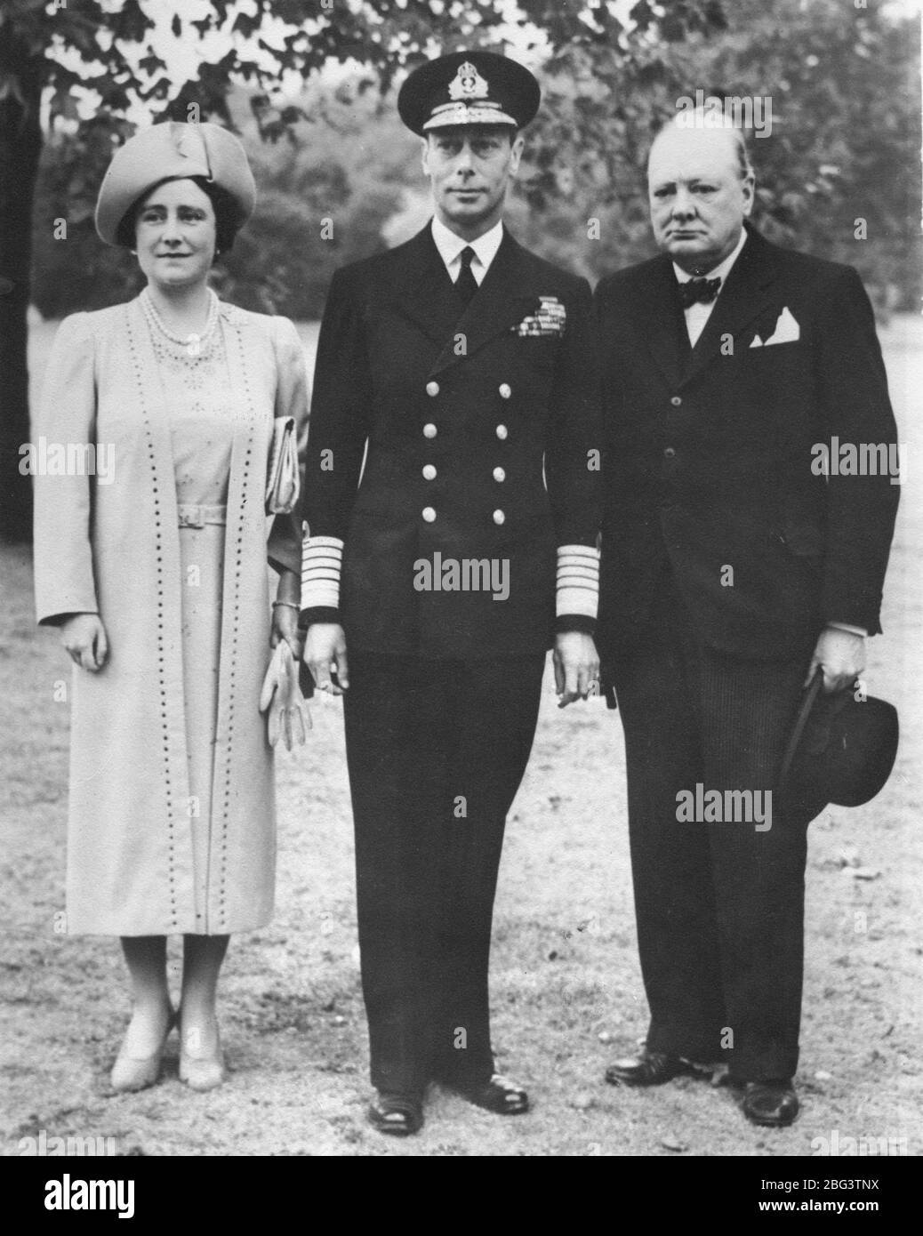 English King George VI, Queen Elizabeth I, and the new British  Prime Minister, Winston Churchill. 1940.   To see my other WW II images, Search:  Prestor  vintage   WW II  royal Stock Photo