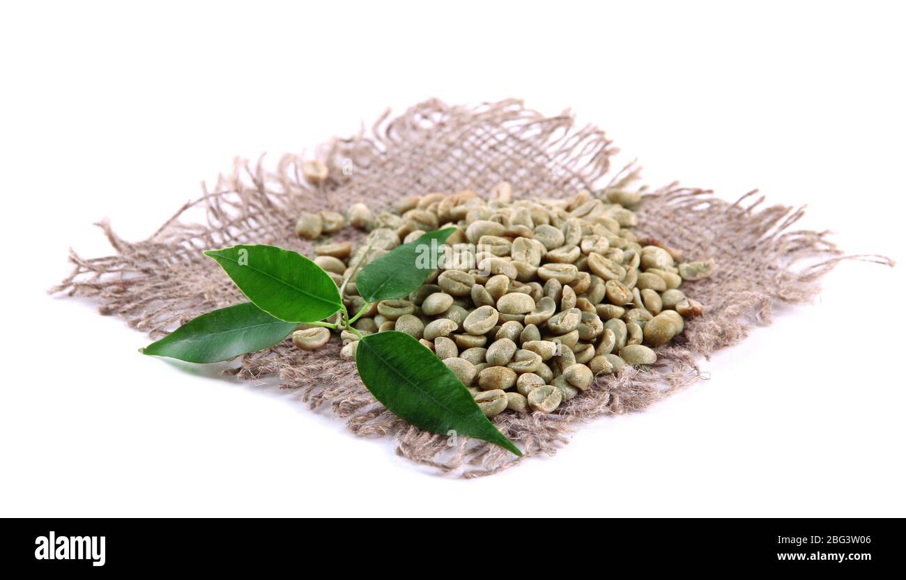 Green coffee beans and leaves isolated on white Stock Photo - Alamy