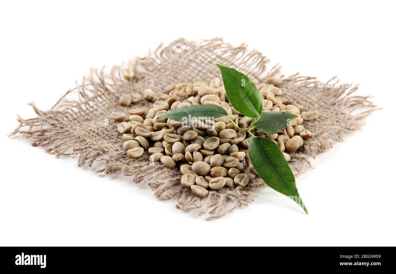 Green coffee beans and leaves isolated on white Stock Photo - Alamy
