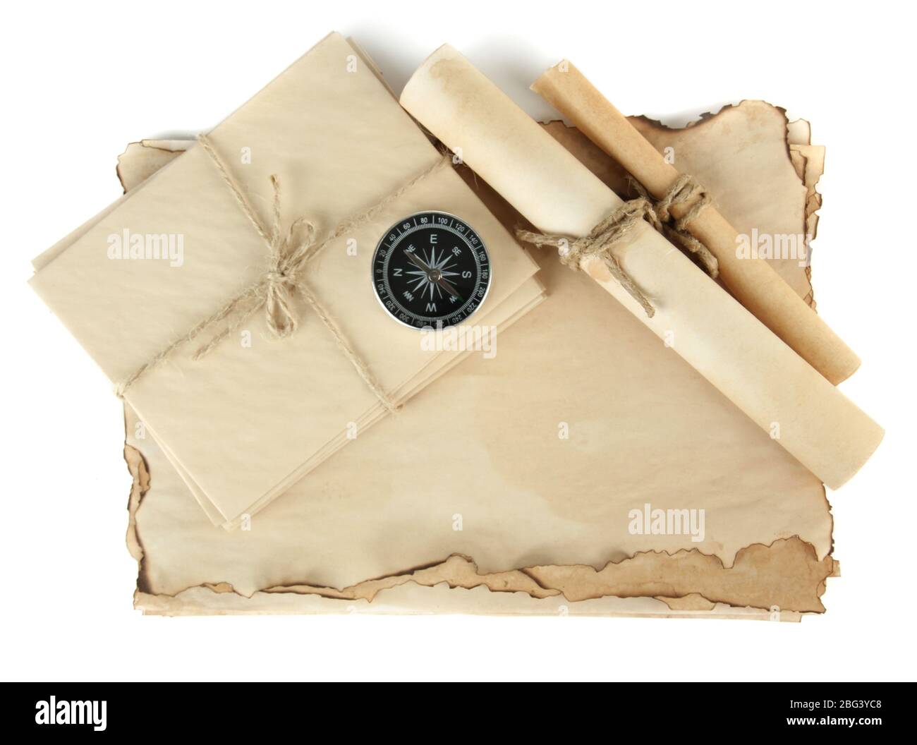 Old paper, scrolls and compass isolated on white Stock Photo