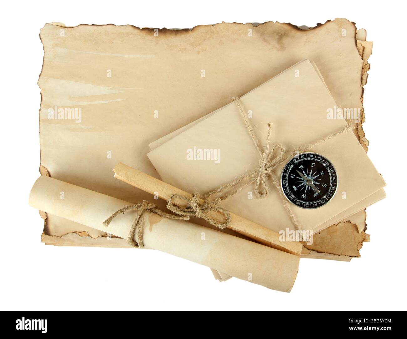 Old paper, scrolls and compass isolated on white Stock Photo