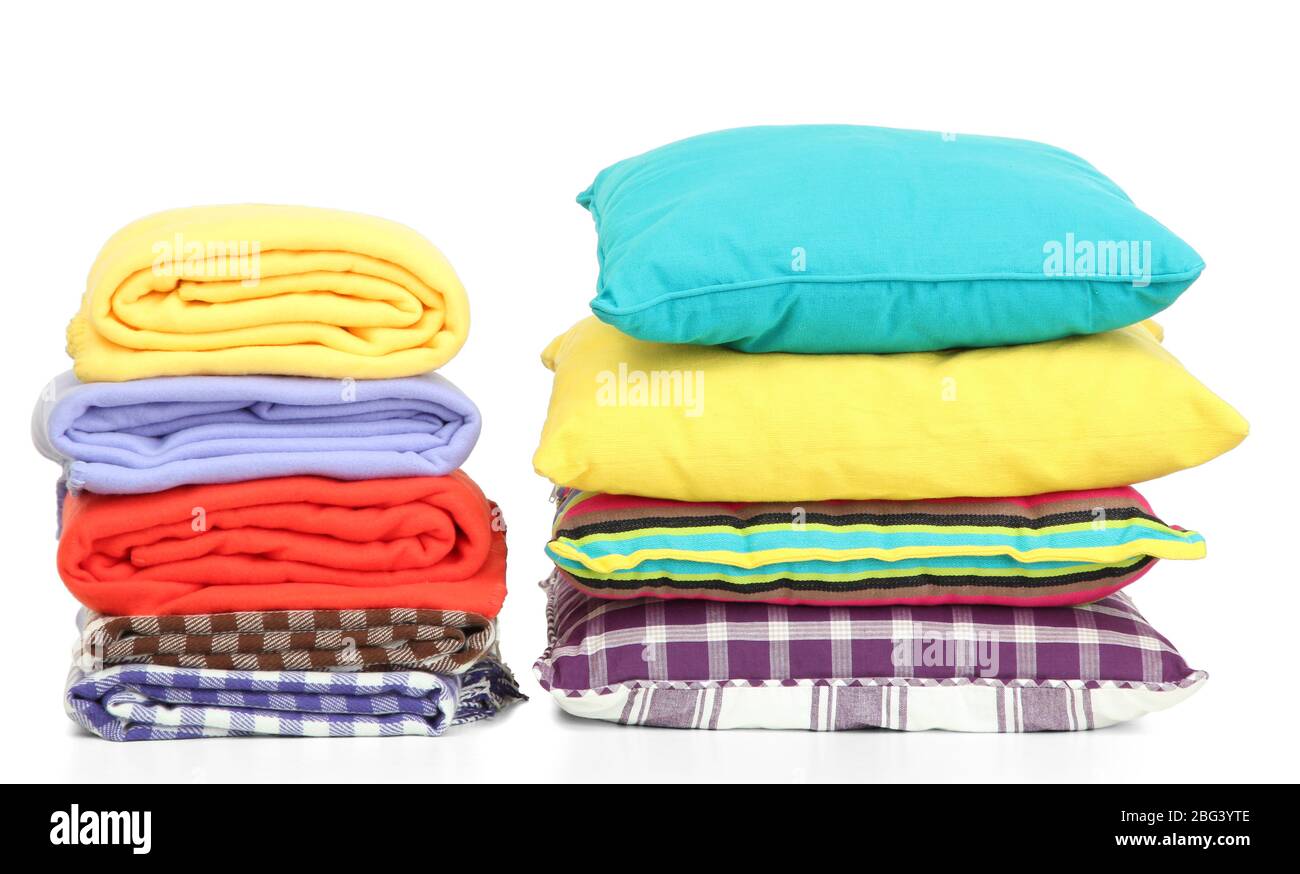 Bright pillows and plaids, isolated on white Stock Photo