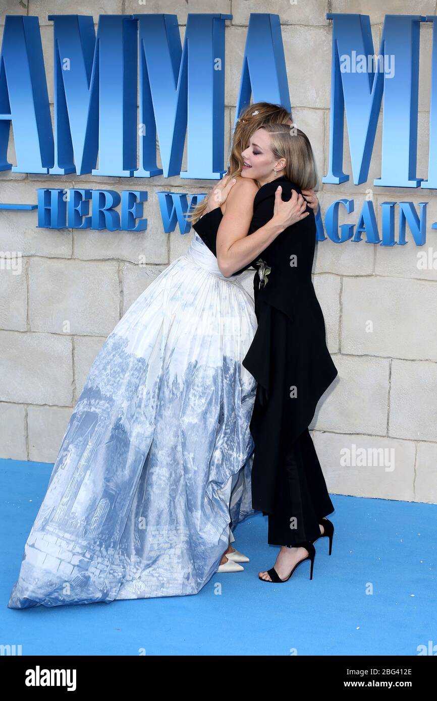 Lily James and Amanda Seyfried attend the World Premiere of 'Mamma Mia! Here We Go Again' at Eventim Apollo on July 16, 2018 in London,UK. Stock Photo