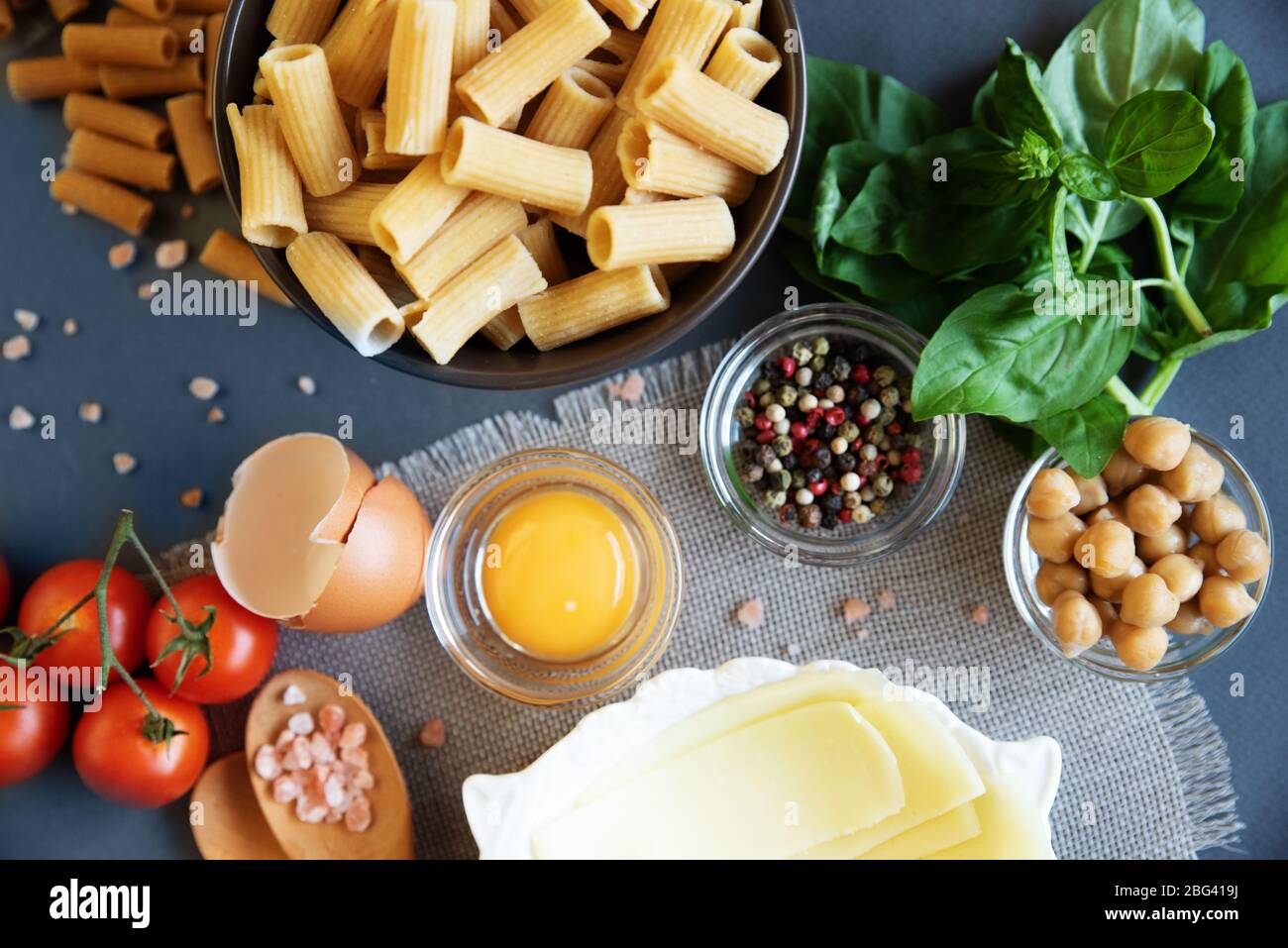 Rigatoni pasta and vegetable ingredients Stock Photo