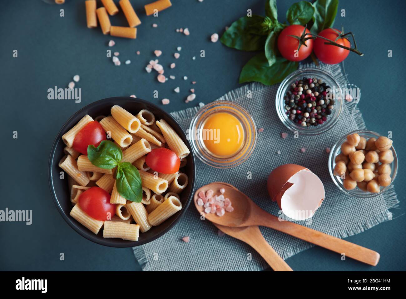 Rigatoni with cherry tomatoes and basil Stock Photo