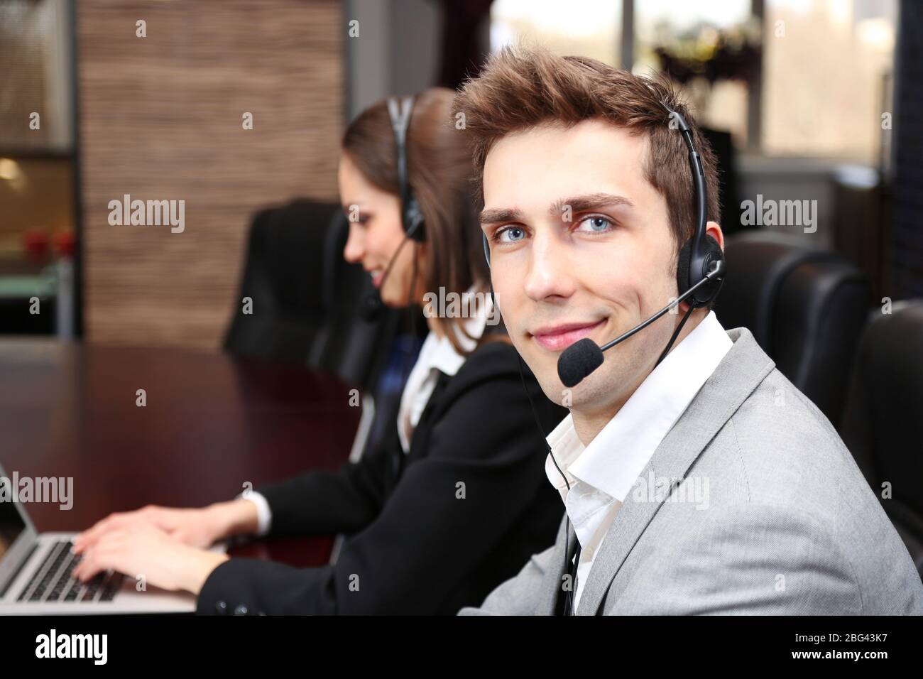 Call center operators at work Stock Photo - Alamy