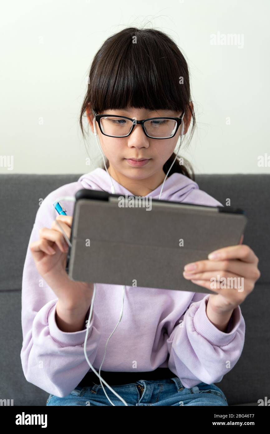 Asian Teen Girl Tablet High Resolution Stock Photography and Images - Alamy