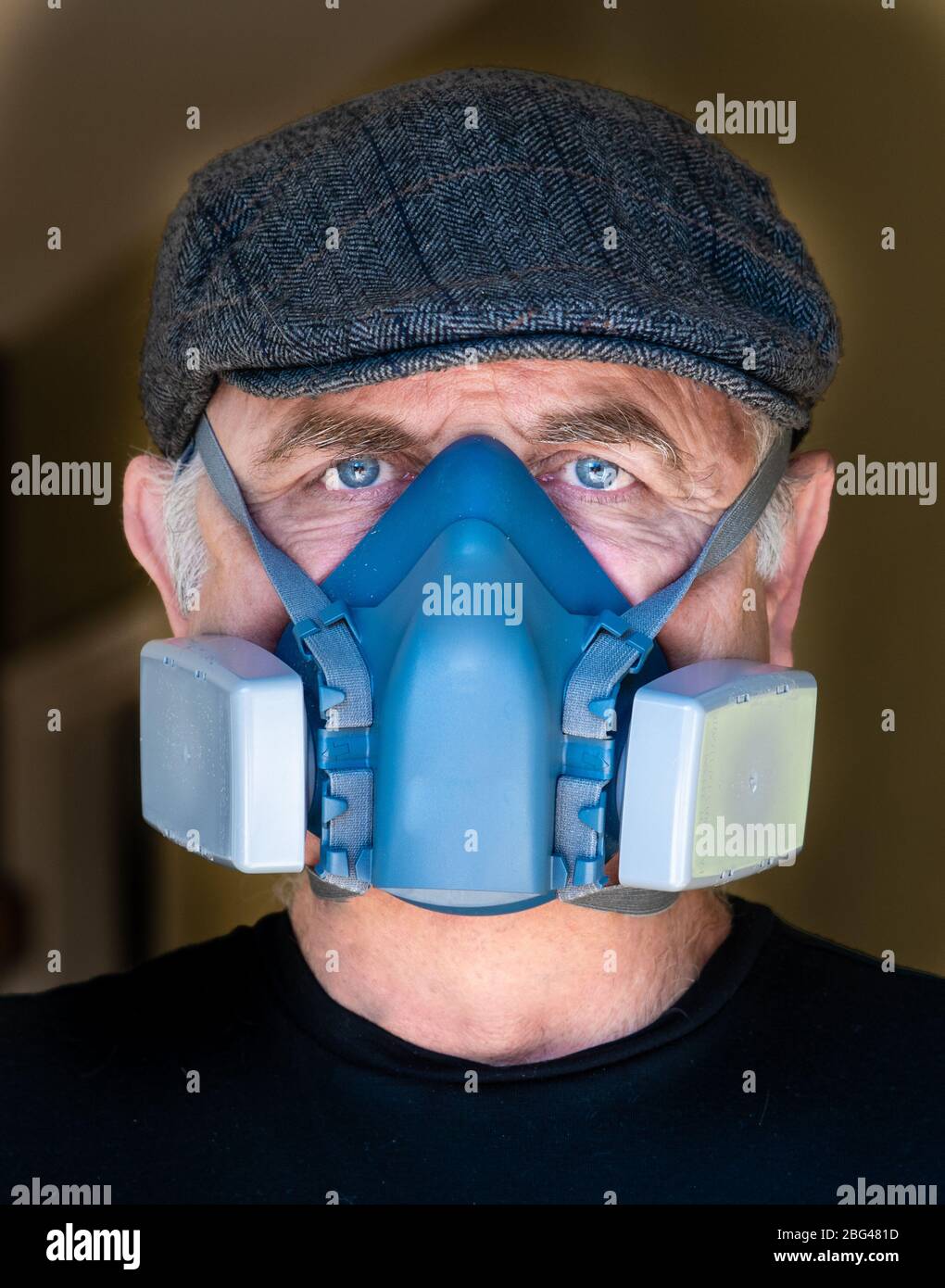 Portrait of a man wearing a HEPA filter mask Stock Photo
