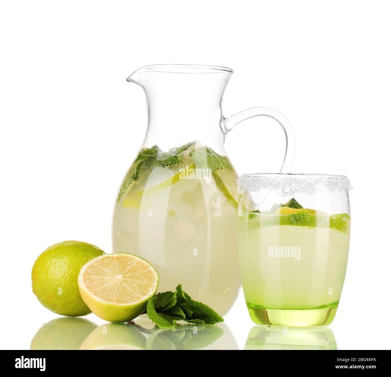 Lemonade in pitcher and glass isolated on white Stock Photo Alamy