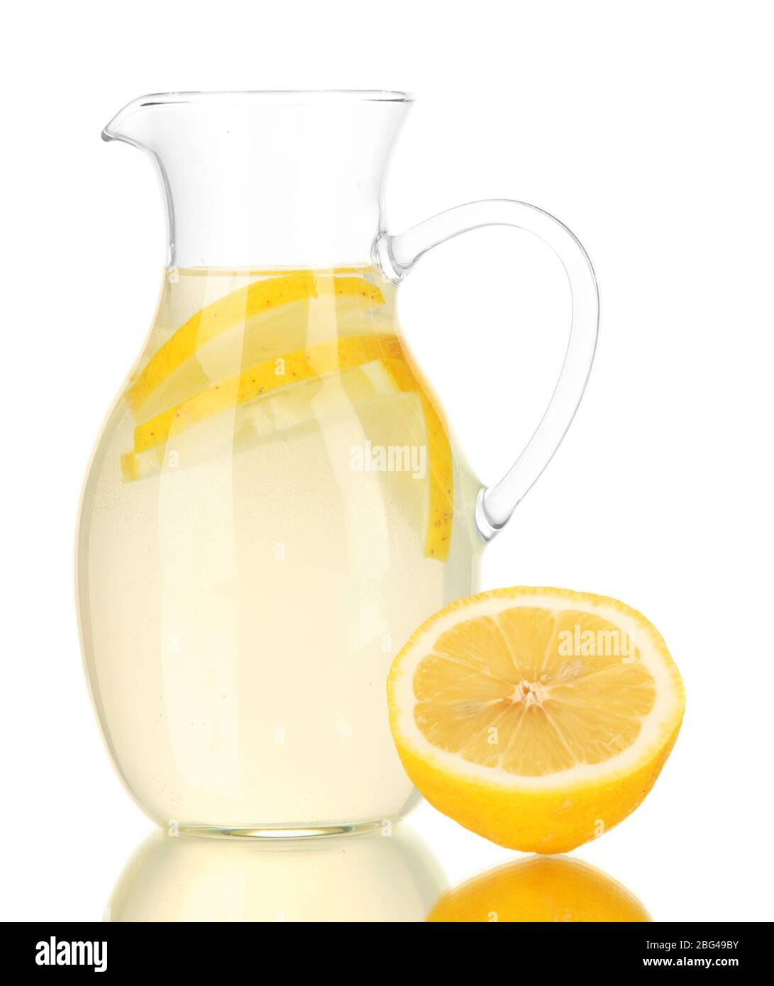 Lemonade in pitcher isolated on white Stock Photo Alamy