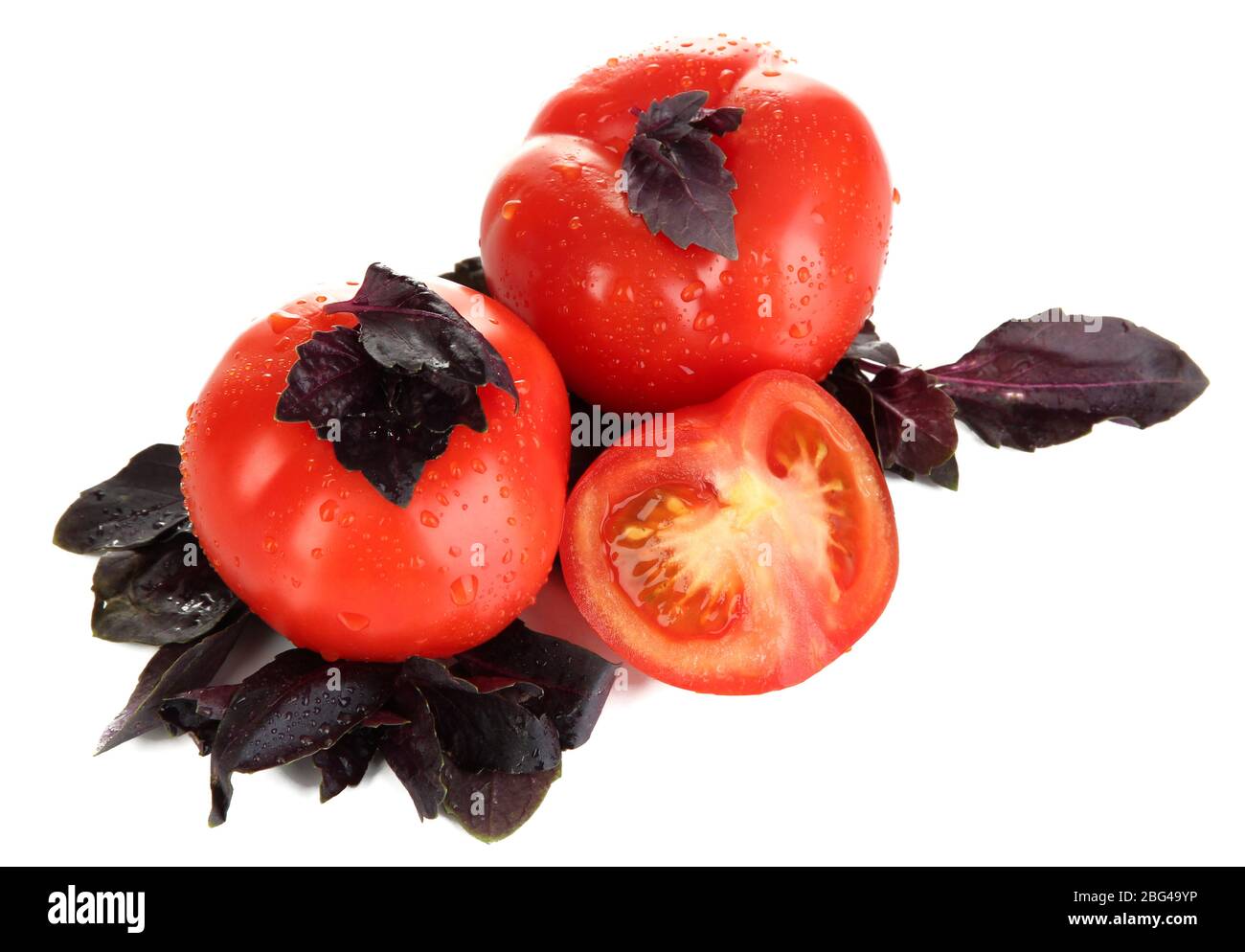 Fresh tomatoes and basil leaves isolated on white Stock Photo - Alamy